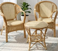 Two rattan chairs with coffee table